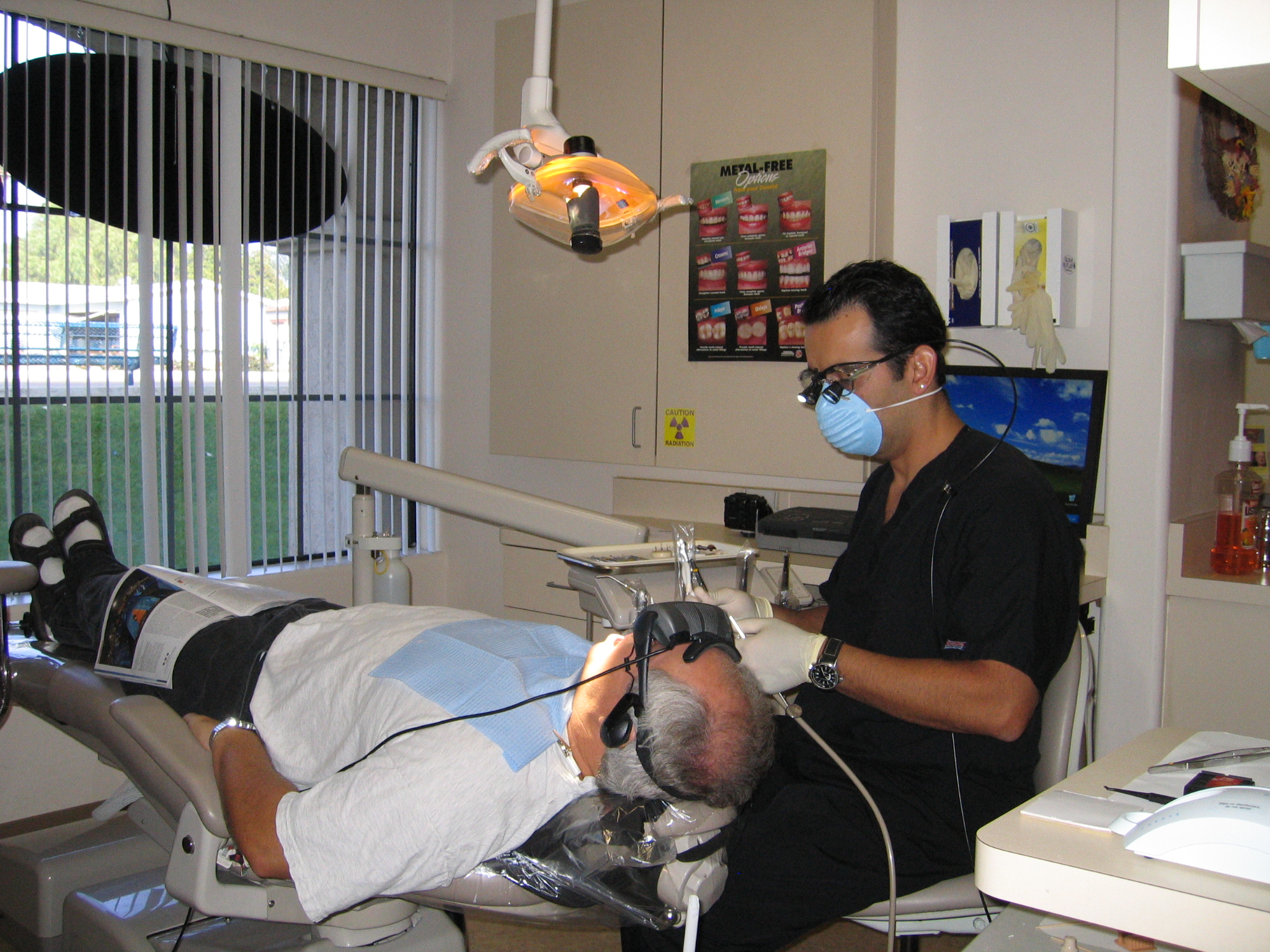 Dr. Eslampour treating a patient